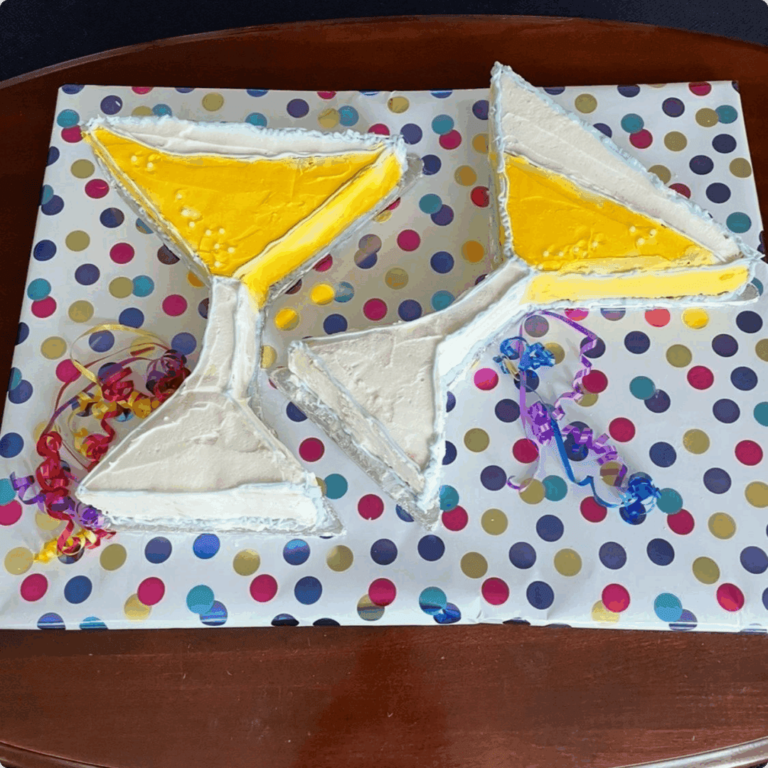 Two triangular yellow desserts on foil sheets.